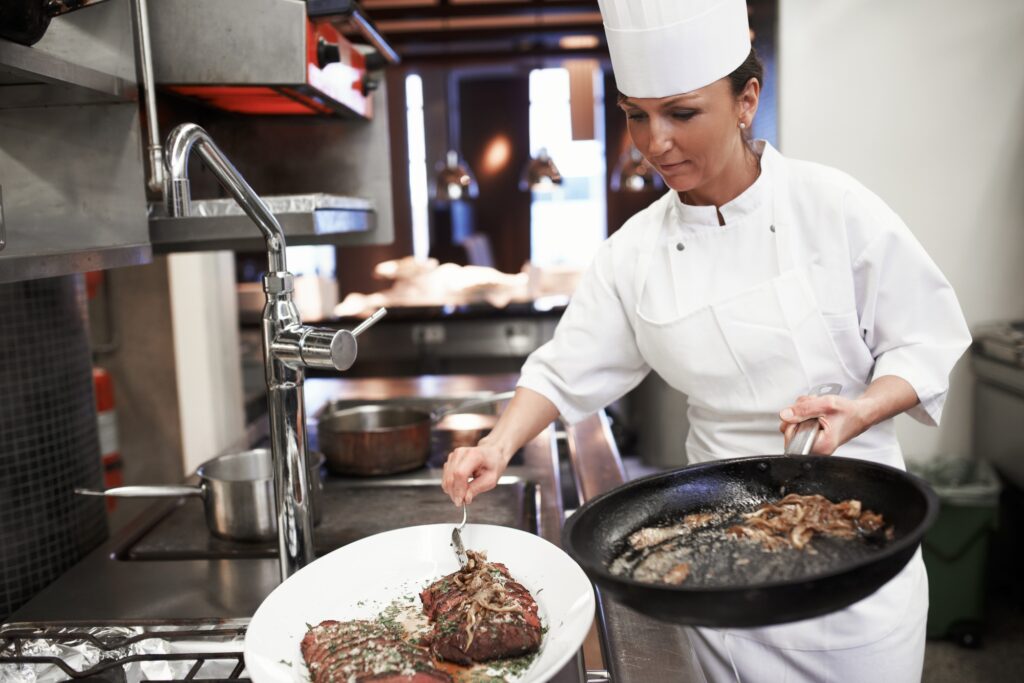 Food for the soul. Shot of chefs preparing a meal service in a professional kitchen.